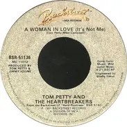 Tom Petty And The Heartbreakers - A Woman In Love (It's Not Me)